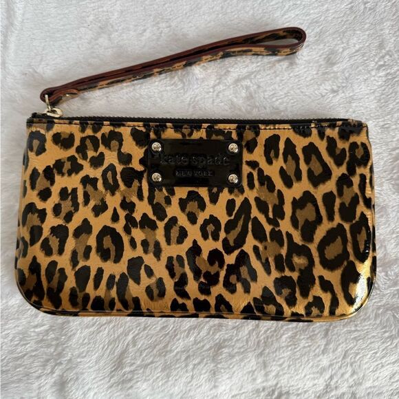 kate spade Handbags - Kate Spade Animal Print Patent Leather Wristlet